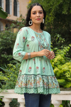 Juniper Pista Green Floral Printed Pure Cotton Peplum Tunic With Lace | Grocsy