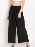 TAG 7 Women Black Solid Flared Palazzos | Grocsy