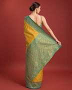 Monjolika Fashion Glamour And Tradition With This Mustard Color Zari Woven Banarasi Tissue Silk Saree | Grocsy