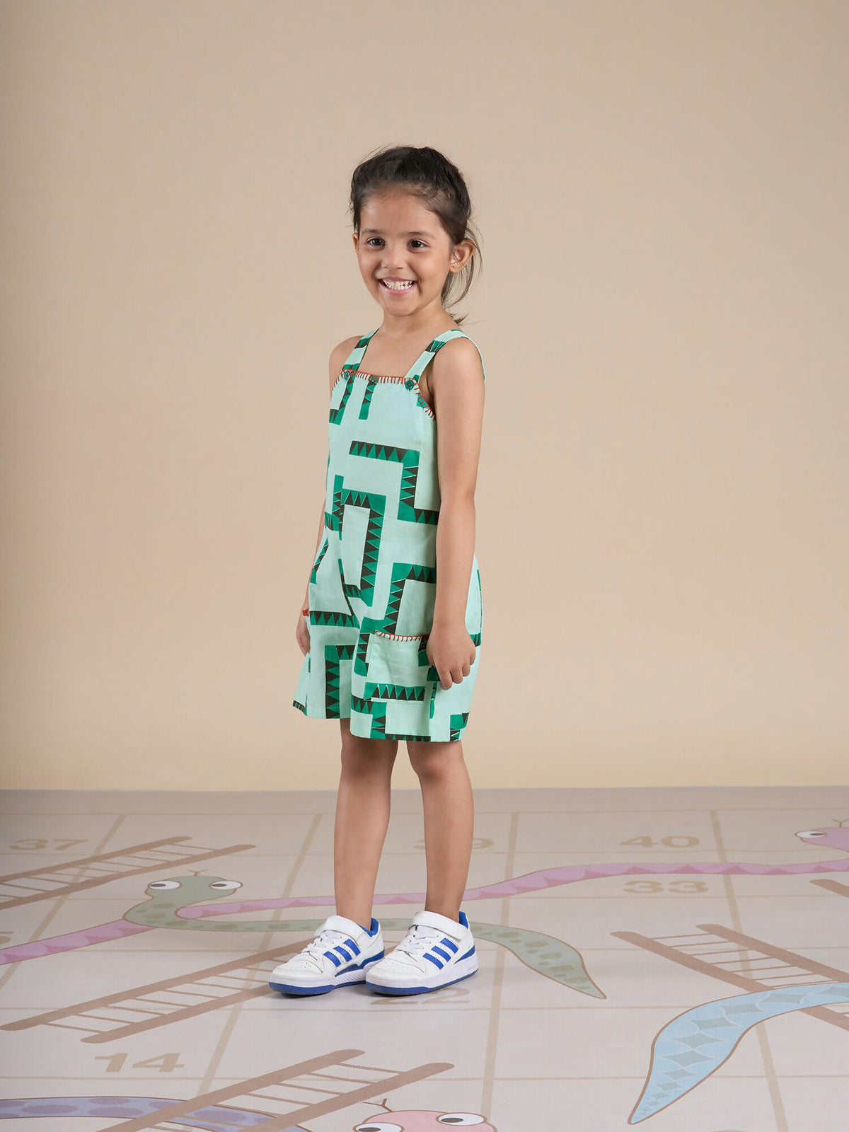 Snakes and Ladders Girls Green Table Print Jumpsuit from Siblings Collection | Grocsy
