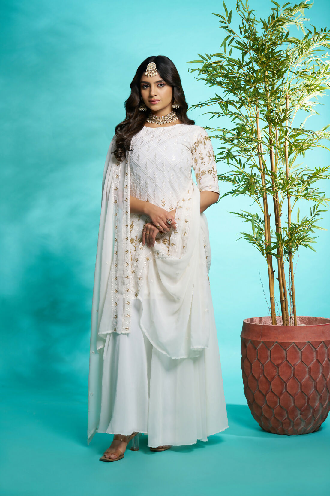 Aayaa Designer Faux Gorgette Embroidery Zari Sequins Thread work Full Flaired plazzo Suit with Dupatta - Off White | Grocsy