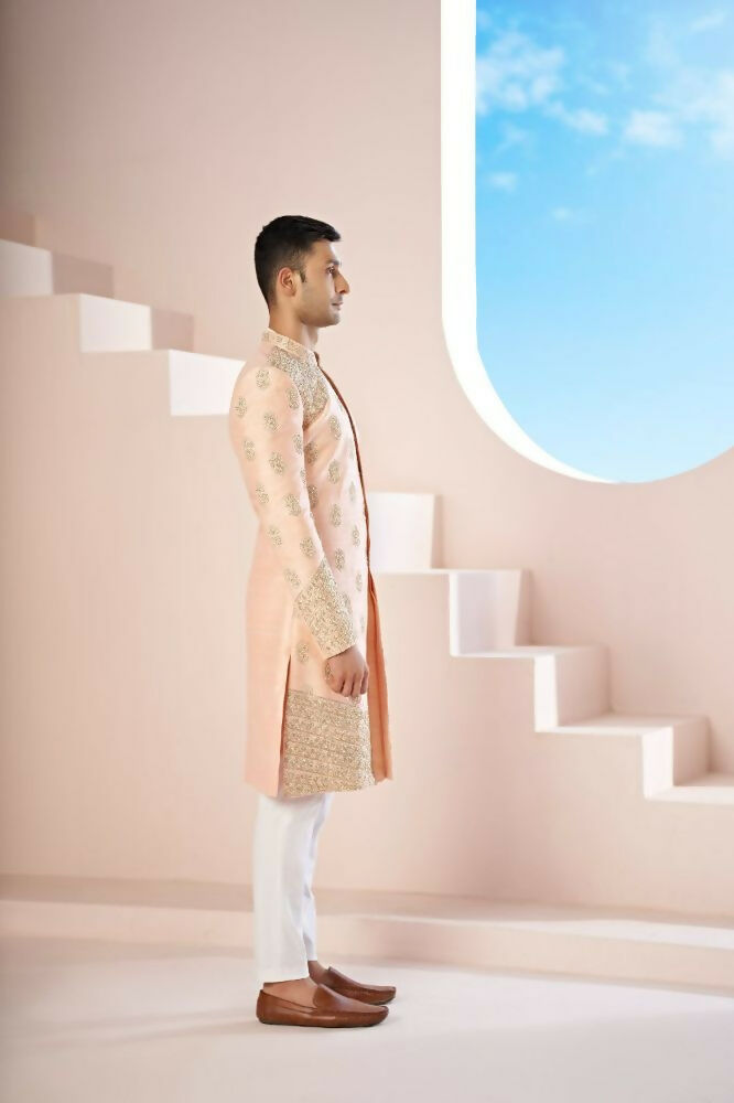 The Peach Sherwani Features Hexagonal Butas , V-Shaped Floral Jal Borders by Hilo Design | Grocsy