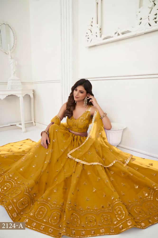 Aastha Fashion Mustard Yellow Butterfly Net Tone To Tone Thread Work And Sandwich Sequence Work Embroidery Wedding Wear Lehenga Choli | Grocsy