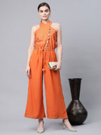 Ahalyaa Womens Orange Crepe Gold Stripped Print Jumpsuit | Grocsy