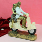Tied Ribbons Romantic Love Couple On Scooter Showpiece Statue Decorative Items For Home | Grocsy