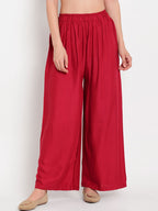 TAG 7 Women Maroon Solid Flared Palazzos | Grocsy