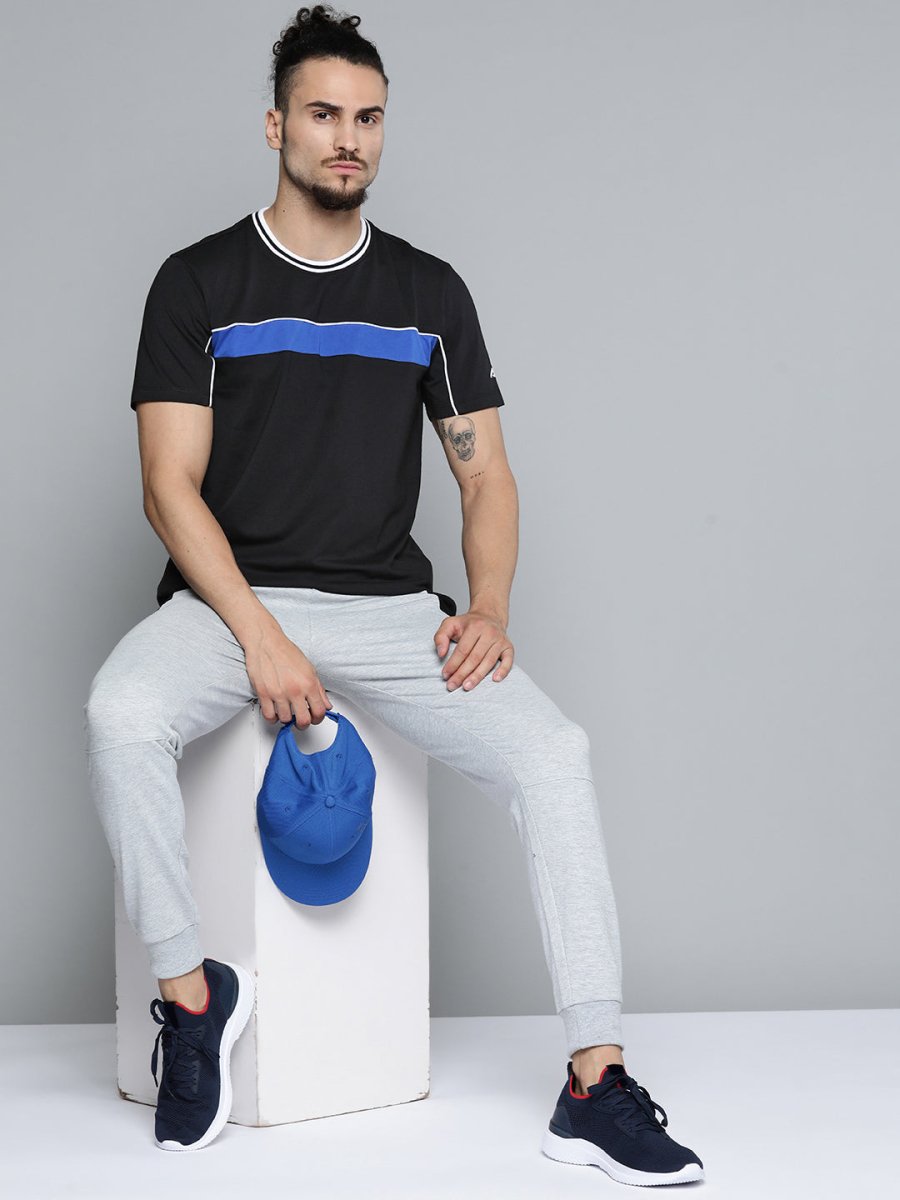 Alcis Men Black Solid Slim Fit Gym T-shirt | Grocsy