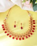 VOJ Gold-Polished Traditional Maroon Stone Studded Necklace And Earrings Set | Grocsy