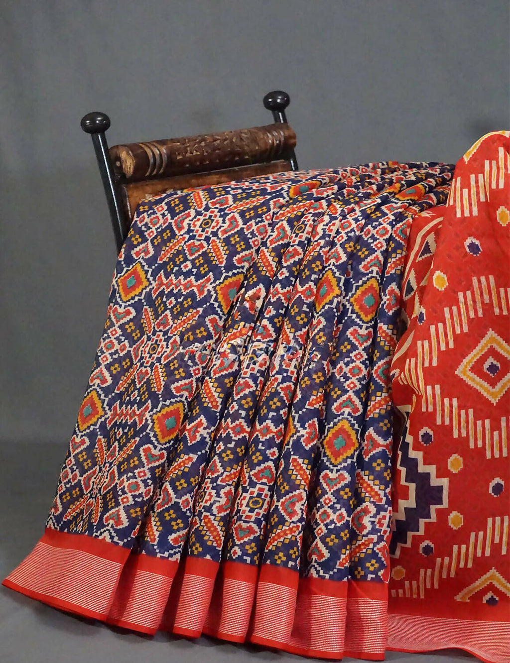 Shades Of Navy Blue And Red Patola Print Semi Chanderi Saree By Gayathri Reddy Designer Studio | Grocsy