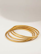NVR Women Set of 4 Gold Plated Handcrafted Bangle | Grocsy