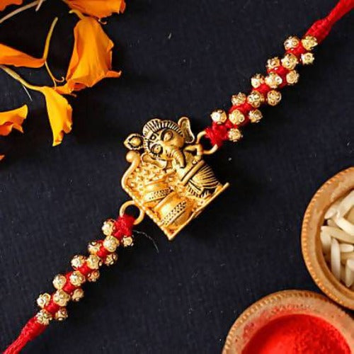 Cute Ganesha Rakhi and Soan Papdi | Grocsy