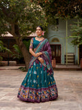 Vastranavya Patola Printed and Foil Work Tussar Silk Lehenga with Unstitched Blouse - Teal | Grocsy