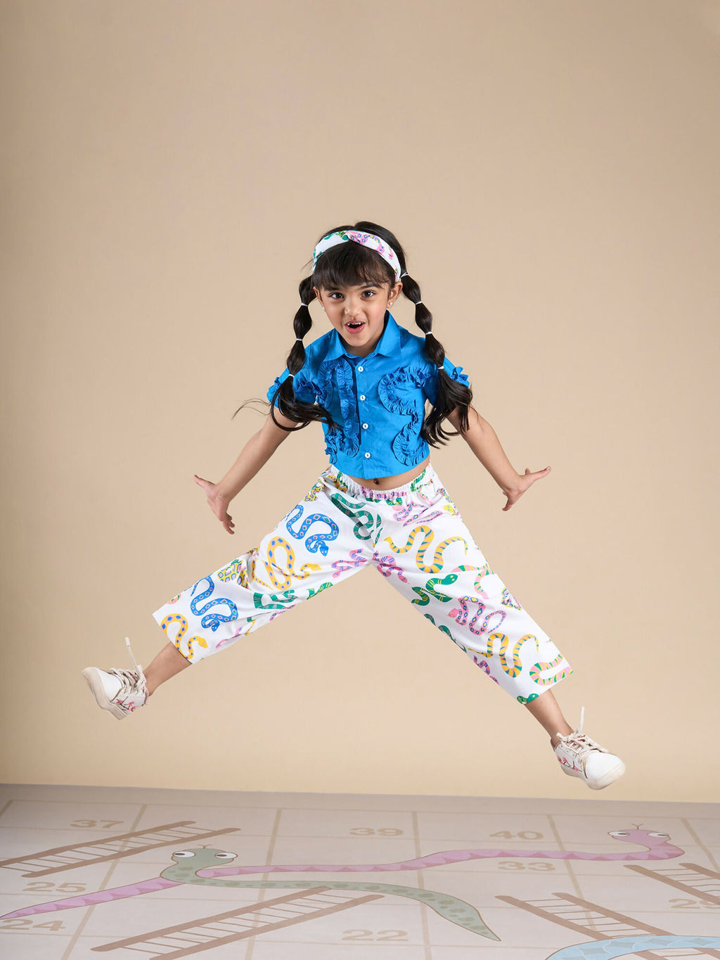 Snakes and Ladders Girls Blue Shirt and Multi Color Snake Print Pant Set from Siblings Collection | Grocsy