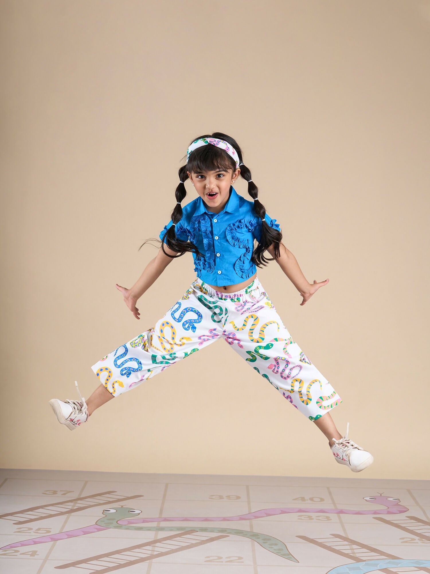 Snakes and Ladders Girls Blue Shirt and Multi Color Snake Print Pant Set from Siblings Collection | Grocsy
