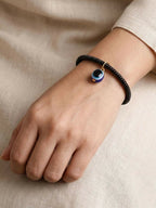 NVR Black Evil Eye Spring Ring Bracelet for Men & Women | Grocsy