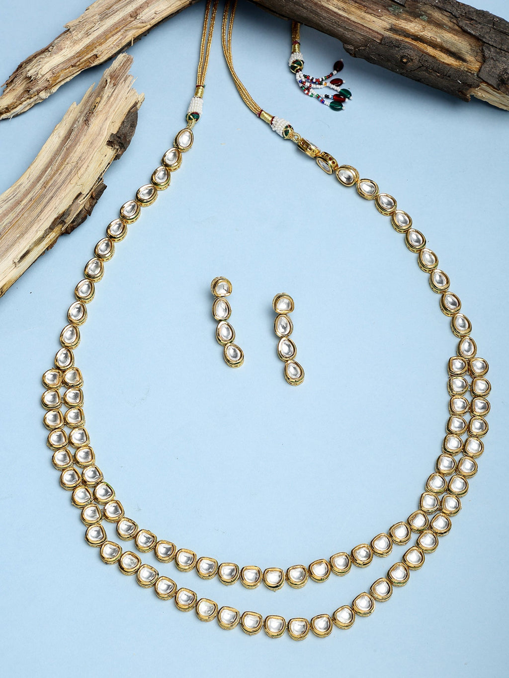Gold-Polished Long Kundan Neckpiece With Earrings - Ruby Raang | Grocsy
