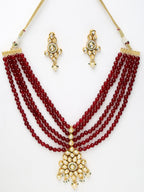 Gold-Polished Maroon Kundan Studded Beaded Jewellery Set - Ruby Raang