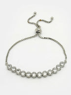NVR Women Silver-Plated American Diamond Studded Rakhi With Roli Chawal | Grocsy