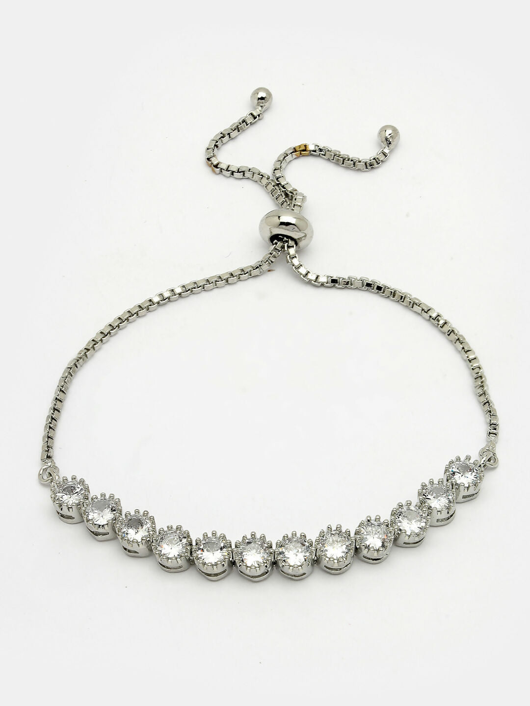 NVR Women Silver-Plated American Diamond Studded Rakhi With Roli Chawal | Grocsy