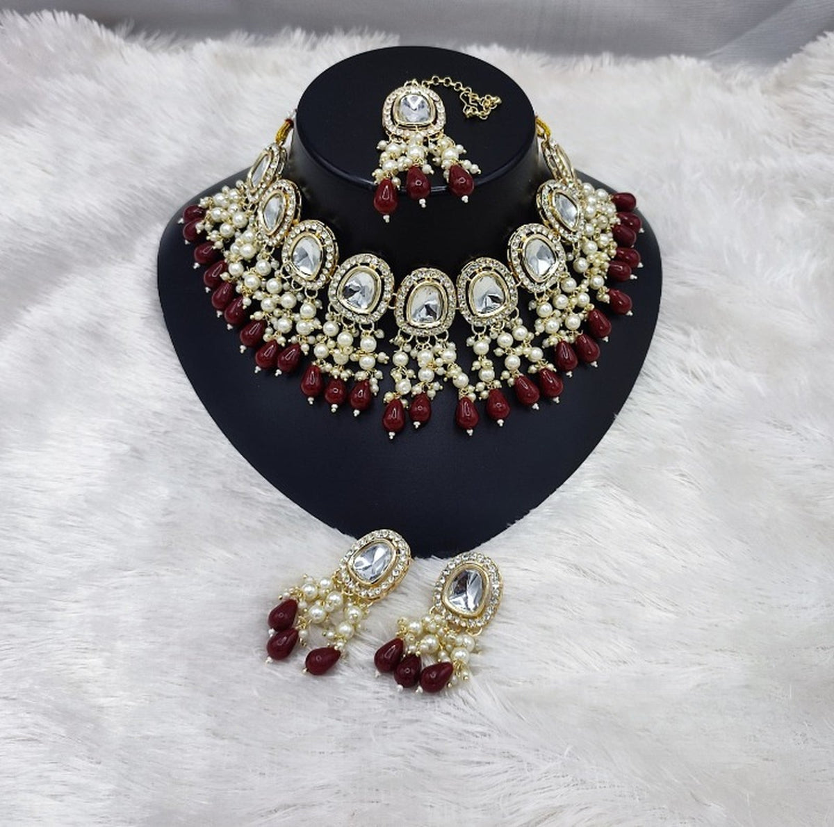 Jewel City Elegant Kundan Pearl Necklace Set with Maroon Drops and Matching Tikka | Grocsy