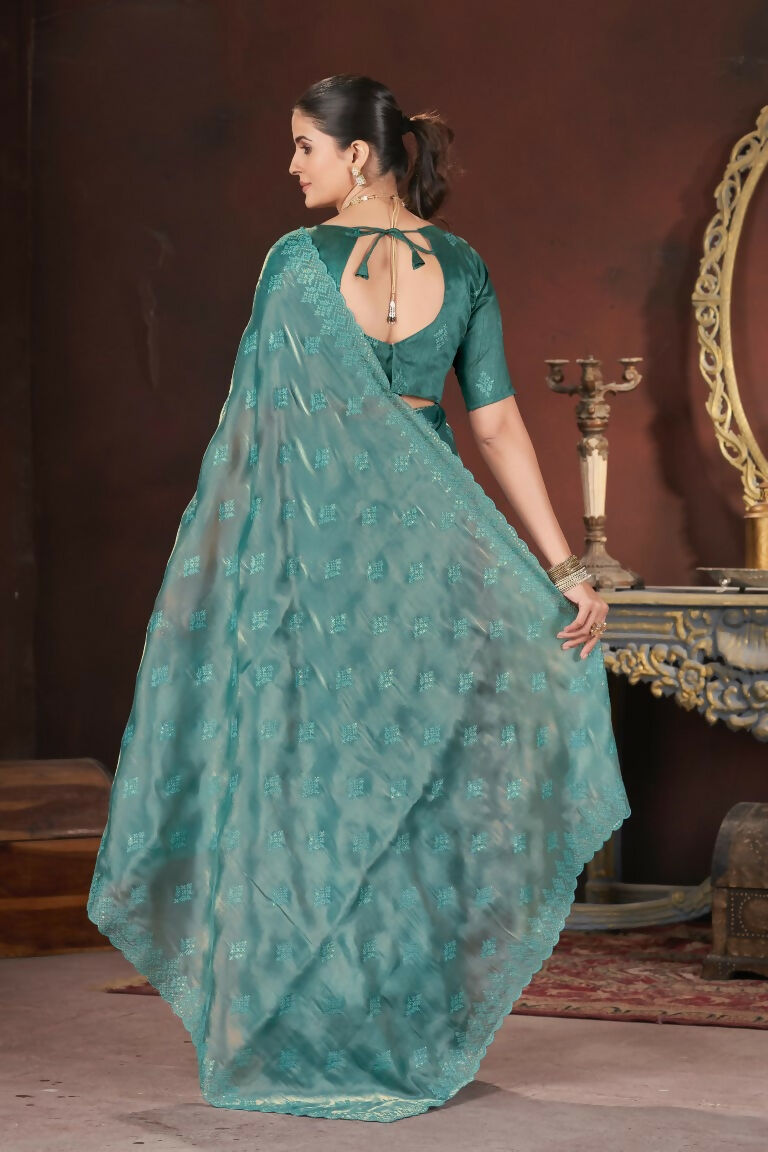 Vastranavya Teal Jimmy Choo Silk 3mm Sequence work with Cross Stitch Embroidery work & Cutwork Border Saree | Grocsy