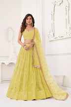 Aastha Fashion Lemon Yellow Butterfly Net Tone To Tone Cotton Thread Work With Sequence Work Embroidery Wedding Wear Lehenga Choli | Grocsy
