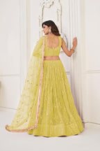 Aastha Fashion Lemon Yellow Butterfly Net Tone To Tone Cotton Thread Work With Sequence Work Embroidery Wedding Wear Lehenga Choli | Grocsy
