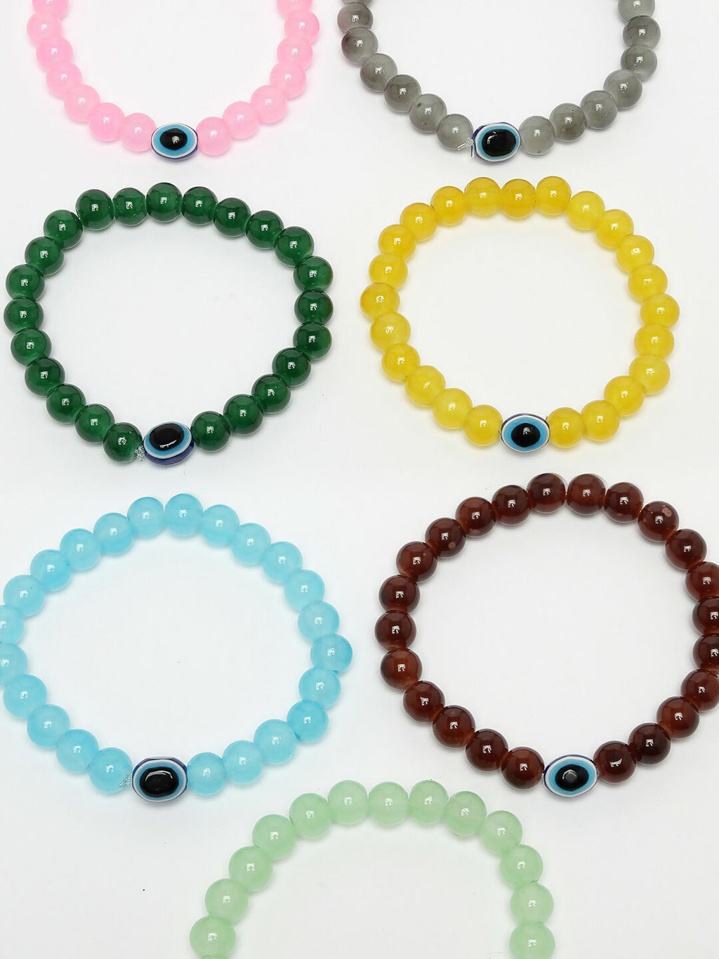 NVR Men & Women Set of 7 Crystals Beaded Evil Eye Elasticated Bracelet