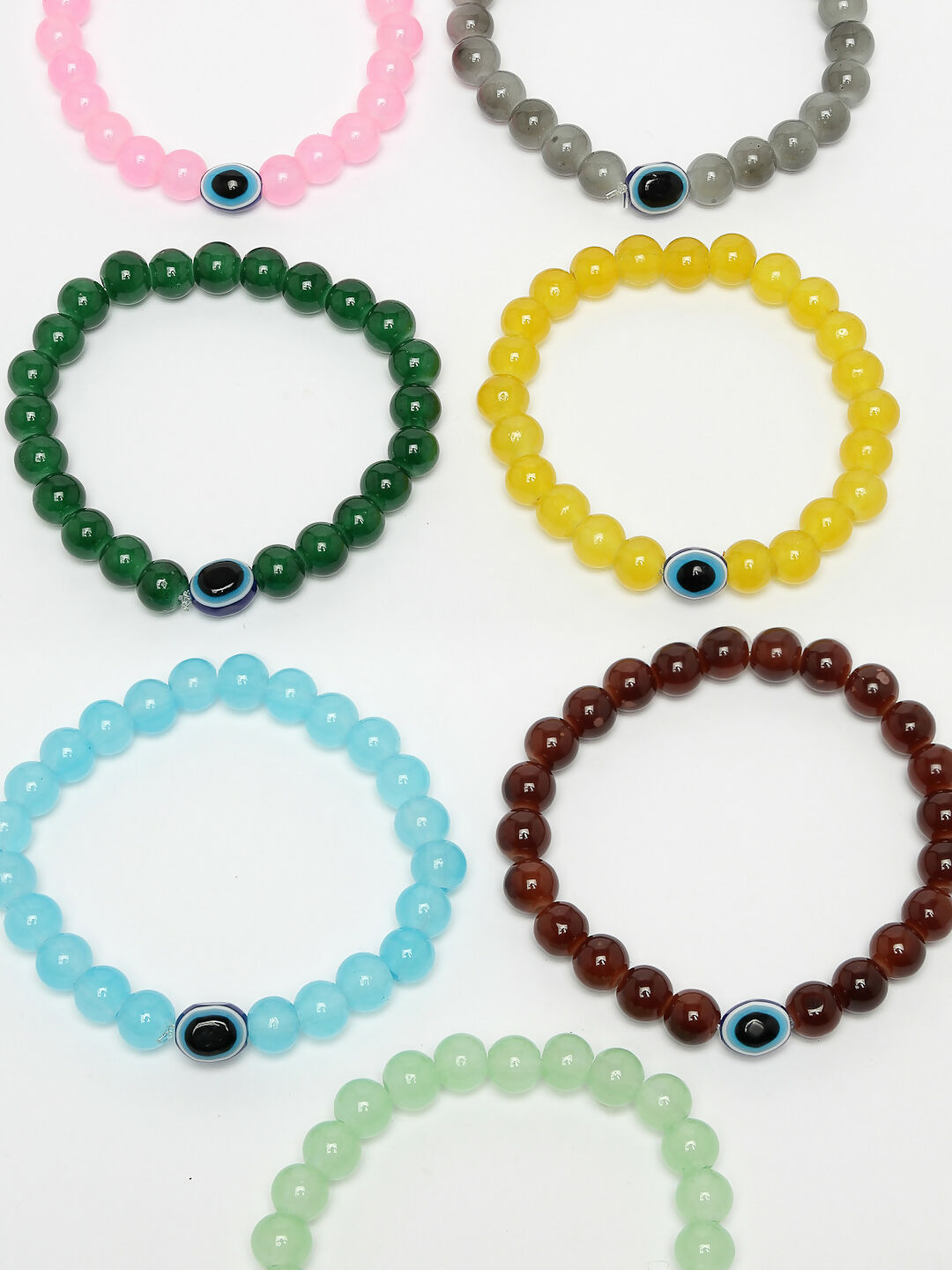 NVR Men & Women Set of 7 Crystals Beaded Evil Eye Elasticated Bracelet