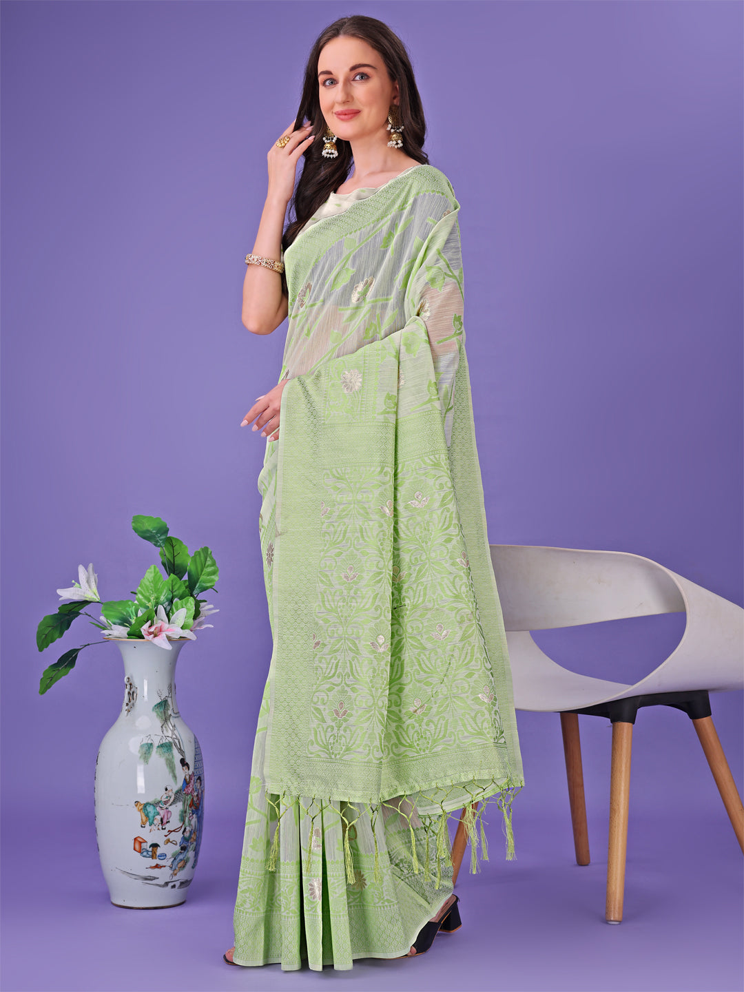 Shree Shyam Fashion Light Green Lichi Silk Saree with Floral Weaving & Tassel Pallu - Elegant Festive & Party Wear Saree | Grocsy