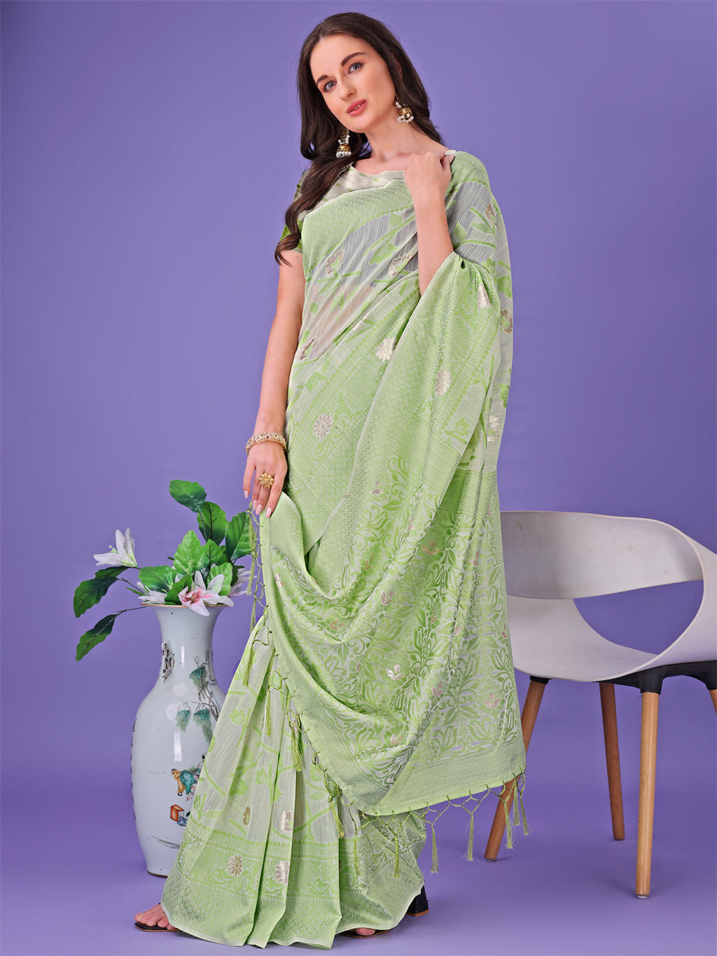 Shree Shyam Fashion Light Green Lichi Silk Saree with Floral Weaving & Tassel Pallu - Elegant Festive & Party Wear Saree | Grocsy