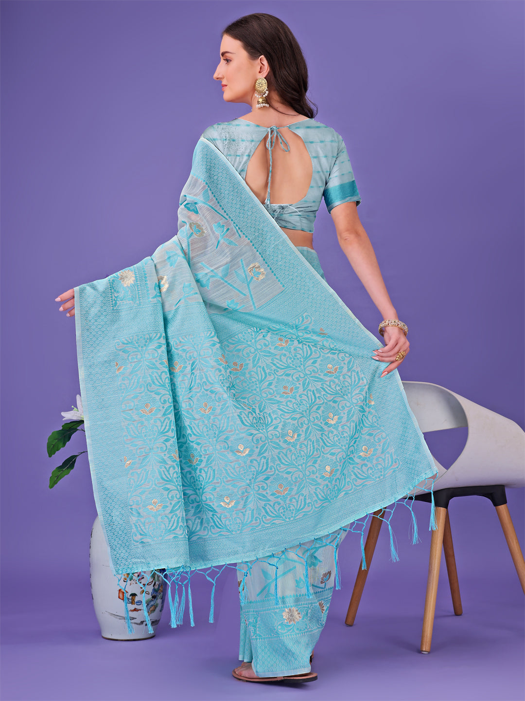 Shree Shyam Fashion Sky Blue Lichi Silk Saree with Floral Weaving & Tassel Pallu - Elegant Festive & Party Wear Saree | Grocsy