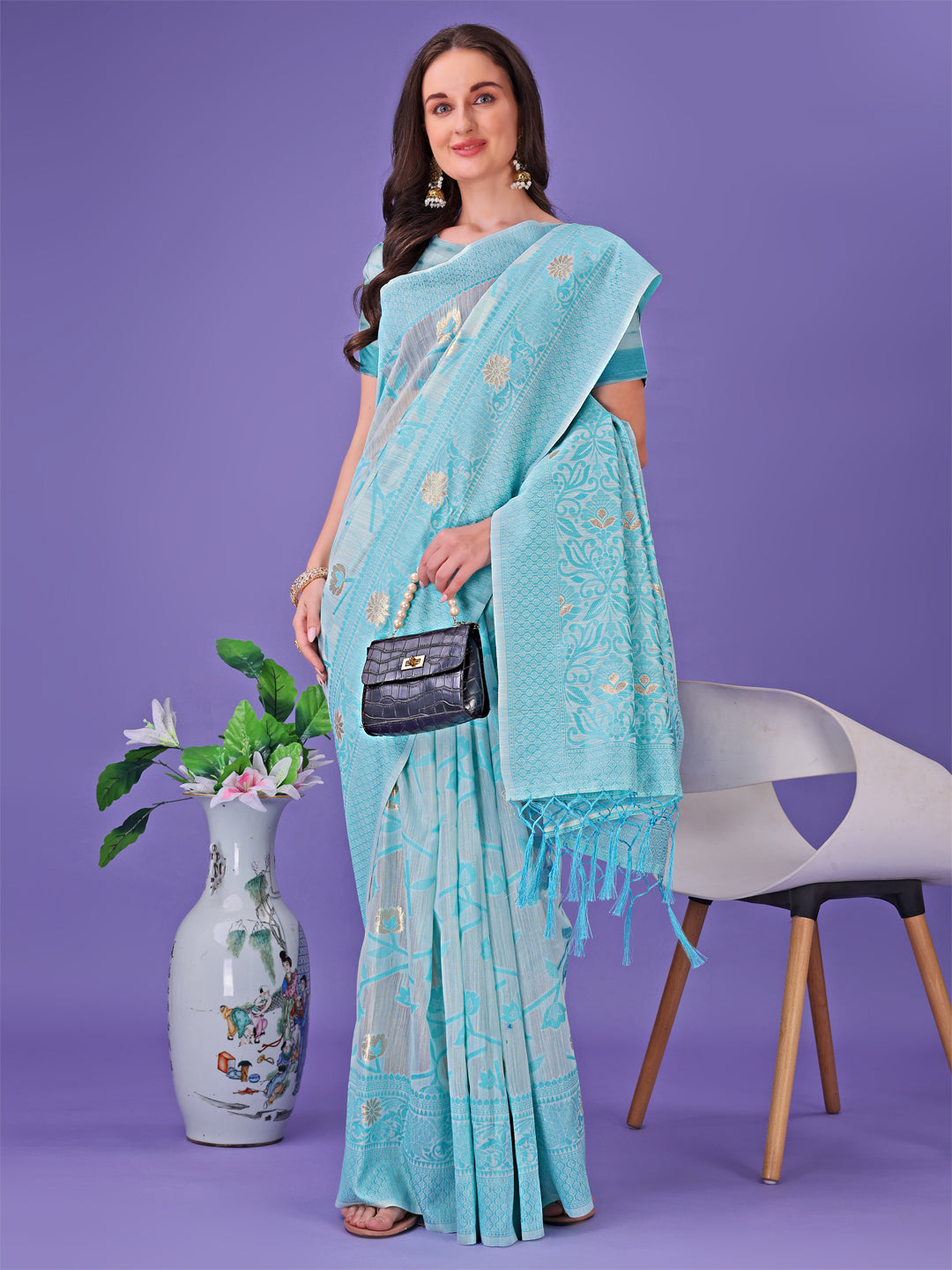 Shree Shyam Fashion Sky Blue Lichi Silk Saree with Floral Weaving & Tassel Pallu - Elegant Festive & Party Wear Saree | Grocsy