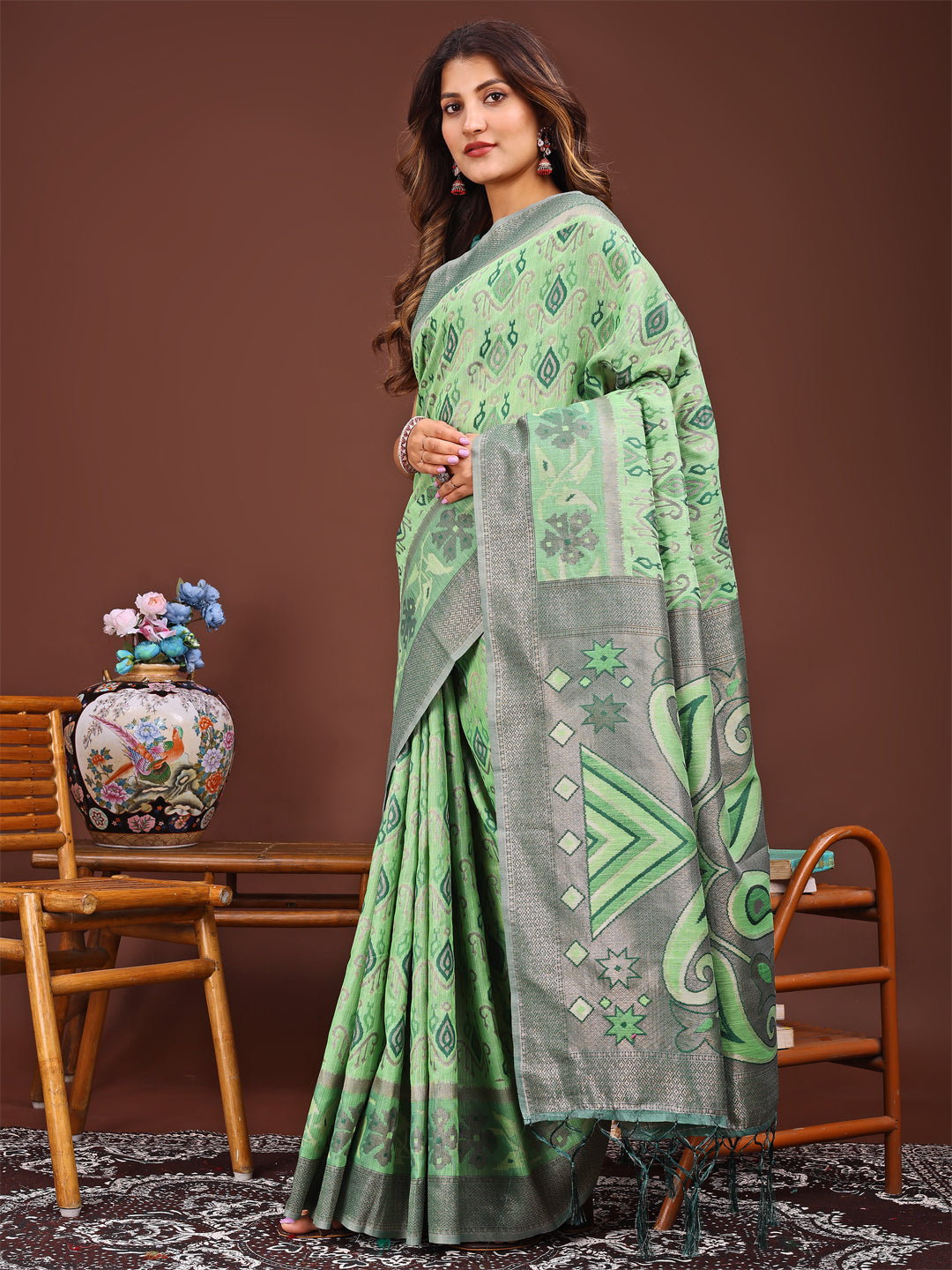 Shree Shyam Fashion Grace in Every Thread: Light green Patola Linen Cotton Saree Woven with Cultural Elegance | Grocsy