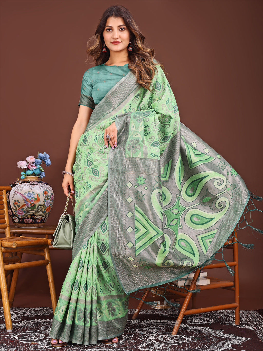Shree Shyam Fashion Grace in Every Thread: Light green Patola Linen Cotton Saree Woven with Cultural Elegance | Grocsy