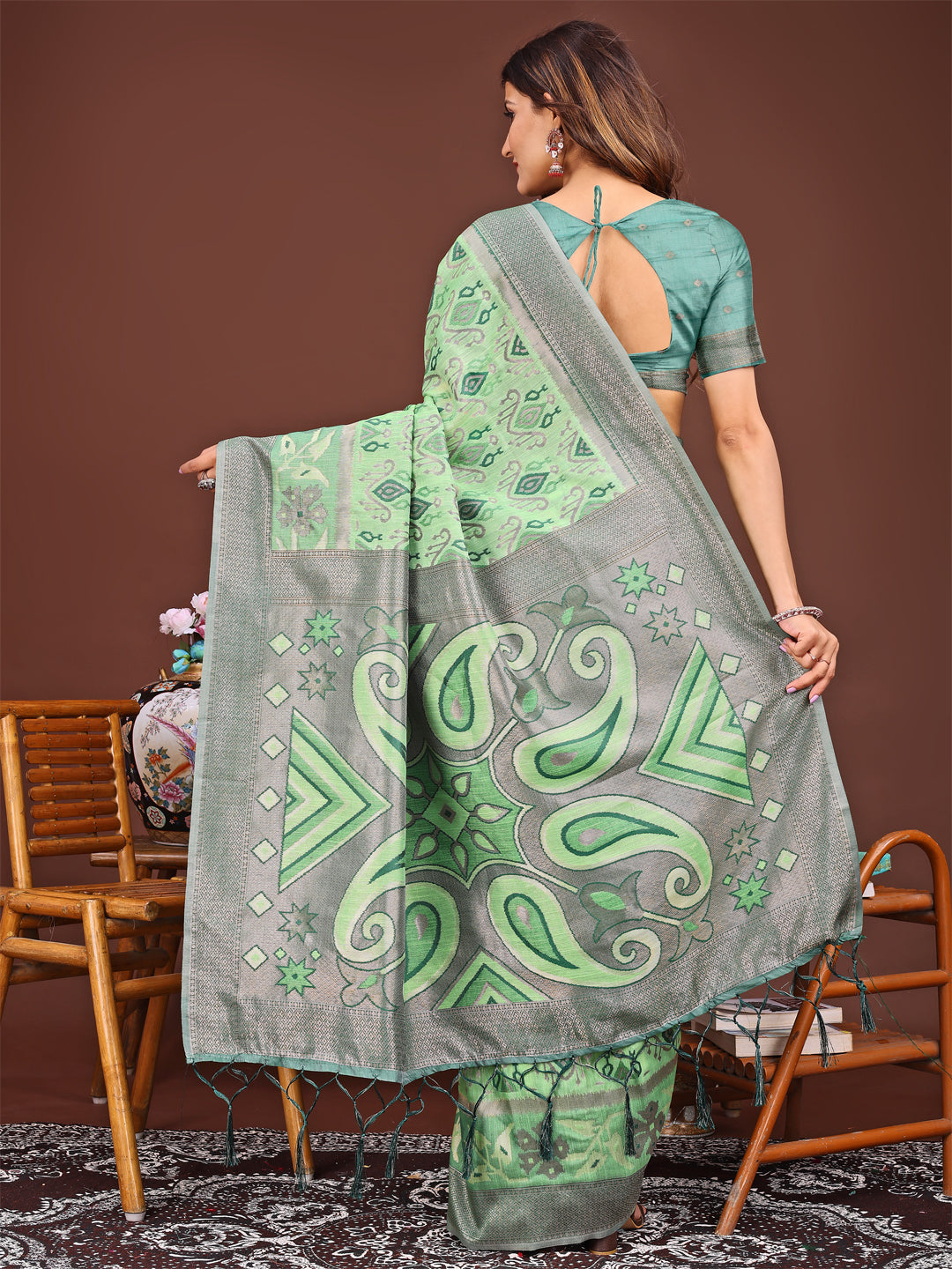 Shree Shyam Fashion Grace in Every Thread: Light green Patola Linen Cotton Saree Woven with Cultural Elegance | Grocsy