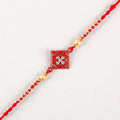 Sleek American Diamond Rakhi And Cashew Jar | Grocsy