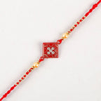 Sleek American Diamond Rakhi And Cashew Jar | Grocsy
