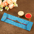 Beautiful Peacock Ethnic Rakhi & Cadbury Temptations | Grocsy