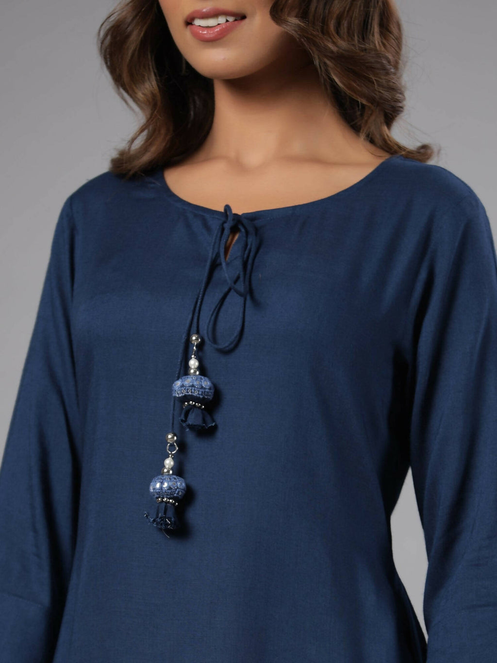 Juniper Women Indigo Rayon Solid Asymmetric Kurta | Grocsy