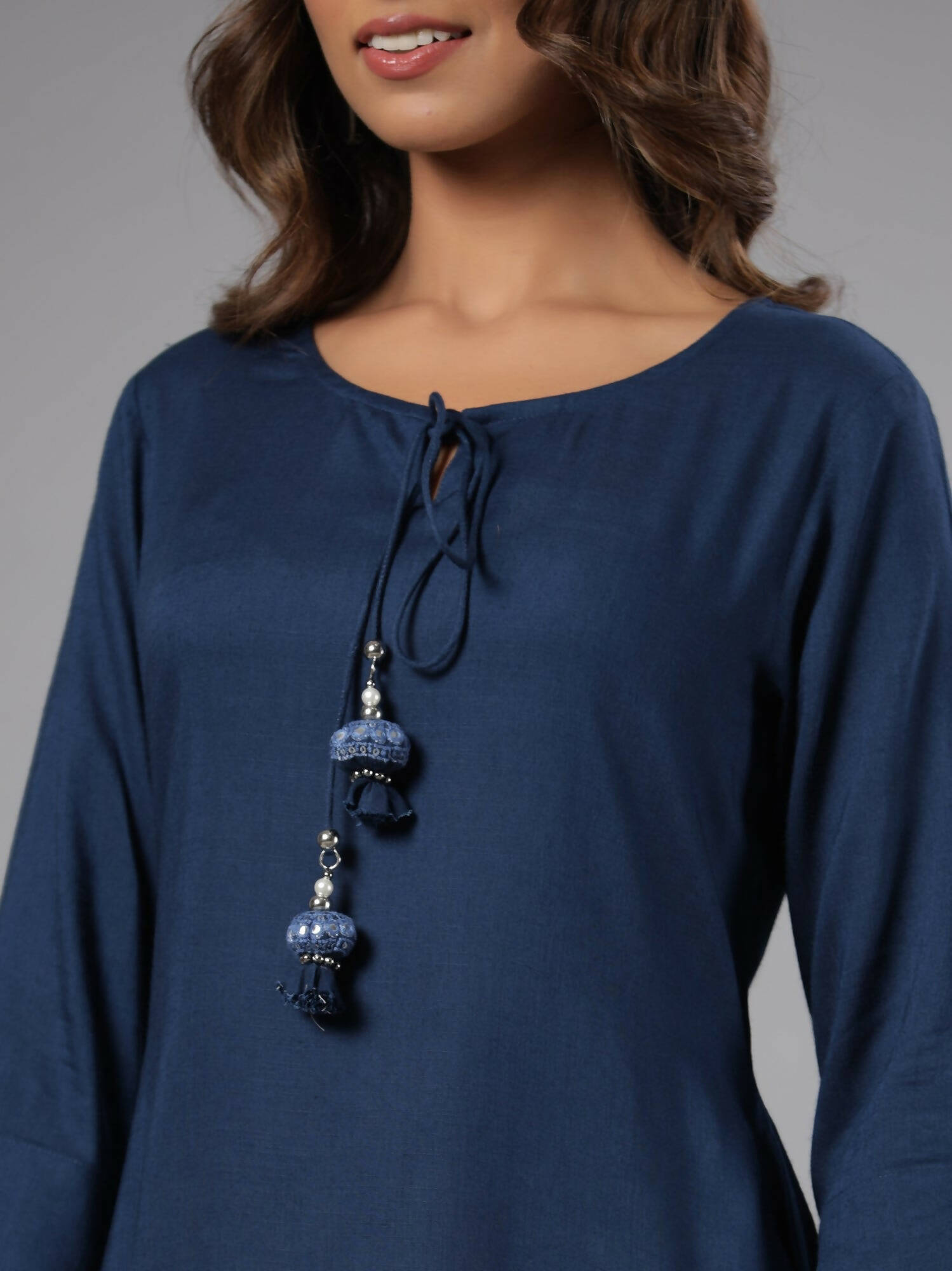 Juniper Women Indigo Rayon Solid Asymmetric Kurta | Grocsy