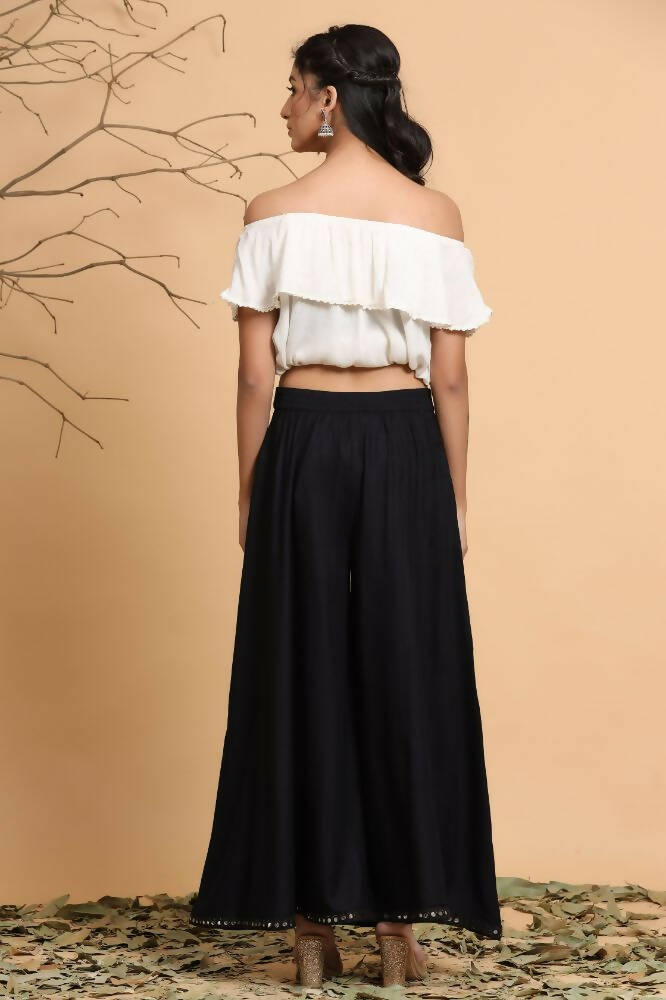 Juniper Women Black Rayon Solid Flared Palazzo | Grocsy