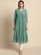 Janasya Women Green Solid Dobby Weave Kurta | Grocsy