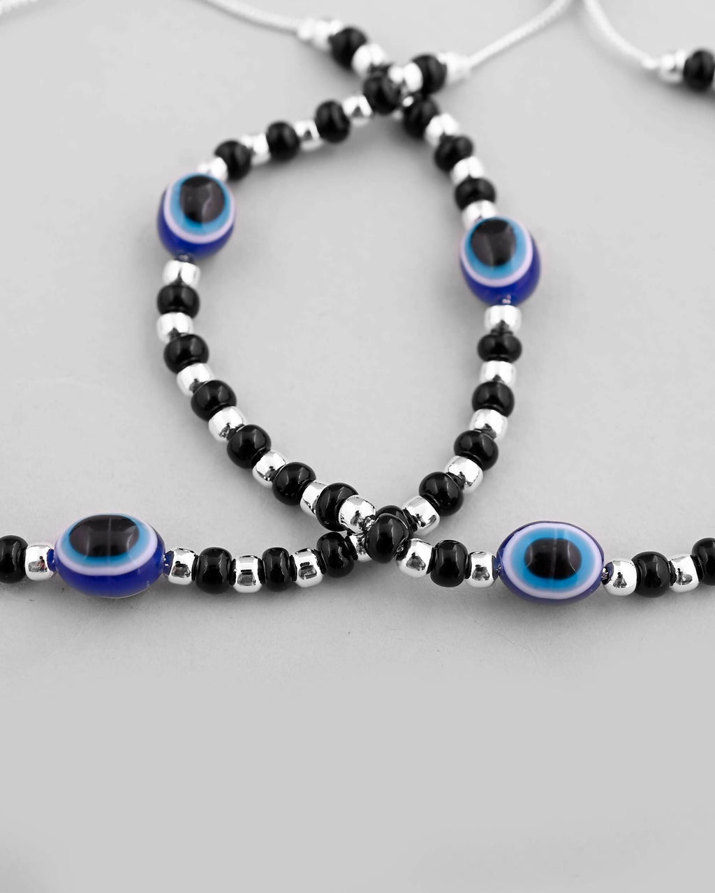 VOJ Set of 2 Silver Plated Evil Eye With Black And Silver Beads Anklet | Grocsy