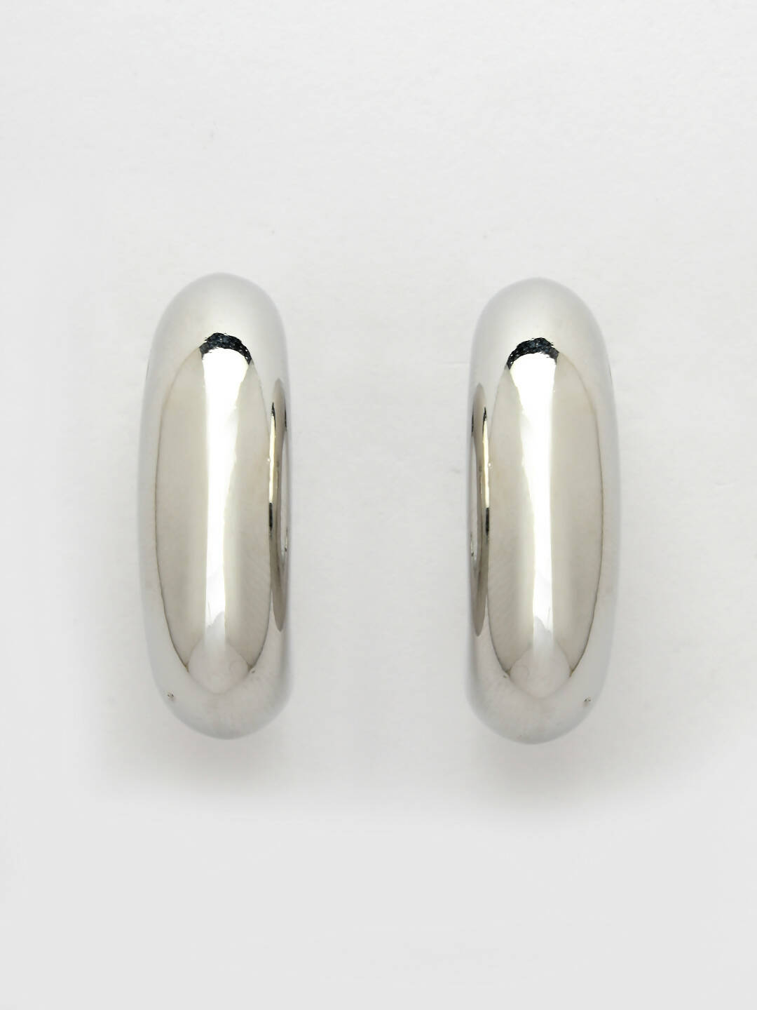 NVR Women Silver-Plated Circular-Shaped Half Hoop Earrings | Grocsy