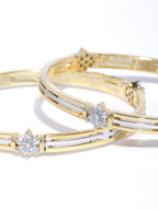 Priyaasi Women Set Of 2 Dual Toned American Diamond Studded Bangles in Floral Pattern - Swadesiicart