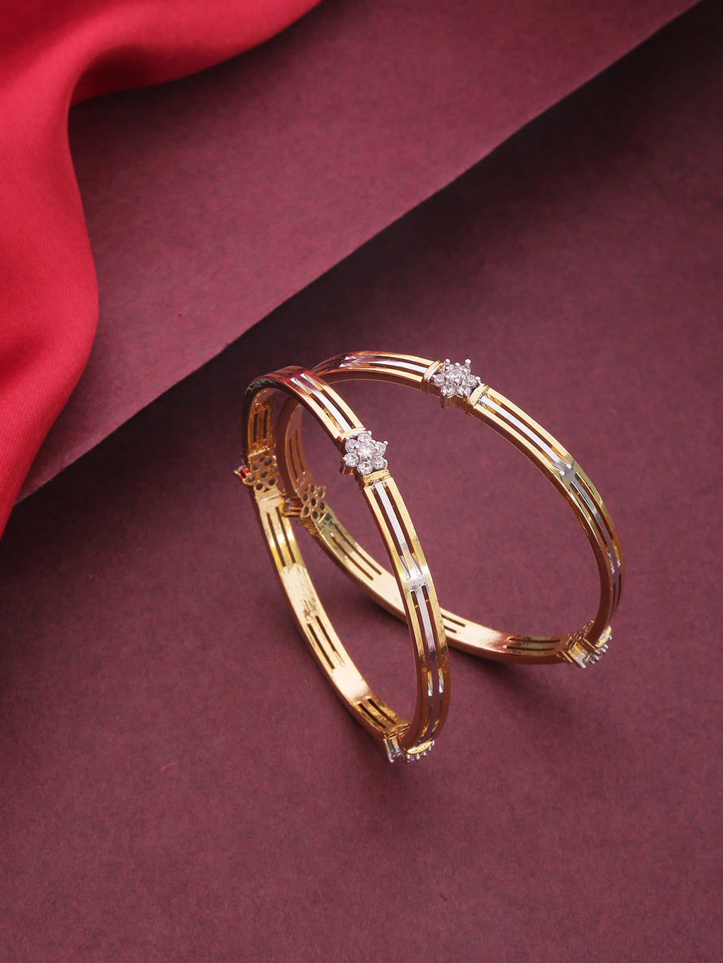 Priyaasi Women Set Of 2 Dual Toned American Diamond Studded Bangles in Floral Pattern - Noz2Toz