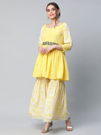 Ahalyaa Women Yellow Crepe Floral Short Kurta with Sharara Set | Grocsy