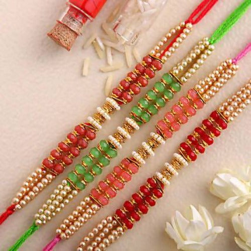 Set of 4 Pretty Pearls Rakhi and Kaju Katli Box | Grocsy