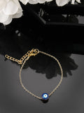 NVR Women Gold-Toned Evil Eye Rakhi With Roli Chawal | Grocsy